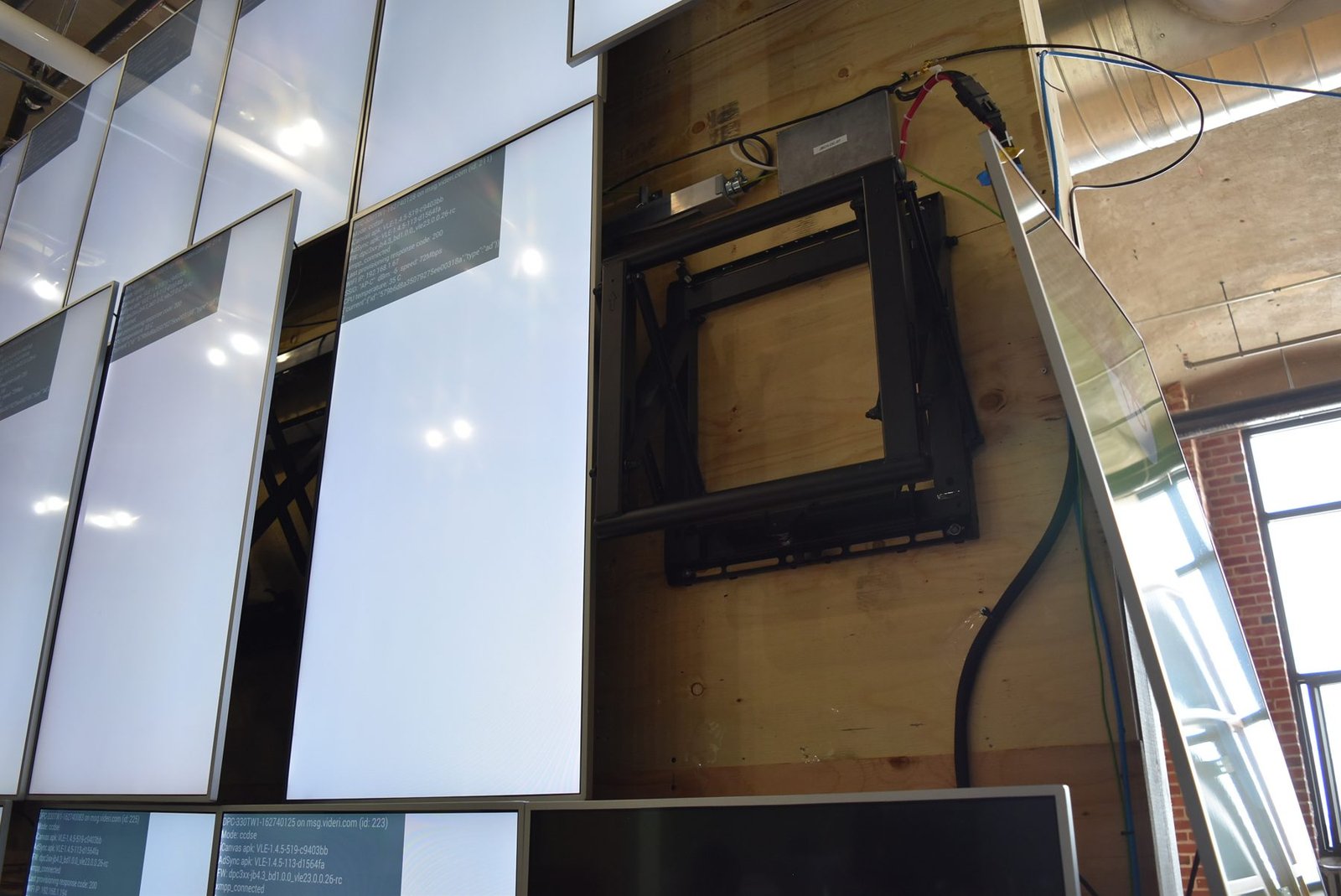LCD Design and Commercial Integration at Scale: The ArcLight Cinemas StoryWall 4 Empty video wall mount on the engineered plywood structure at the Montreal staging site