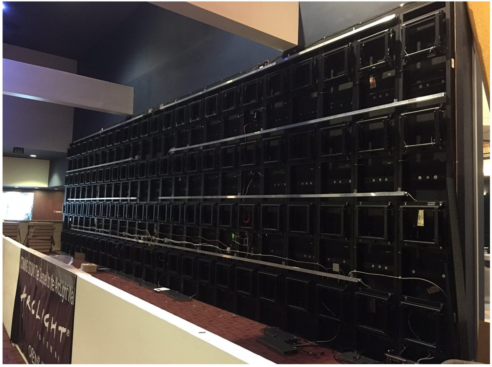 LCD Design and Commercial Integration at Scale: The ArcLight Cinemas StoryWall 1 LCD video wall support structure with the full grid of Premier Mounts press-and-release mounts installed, before screens