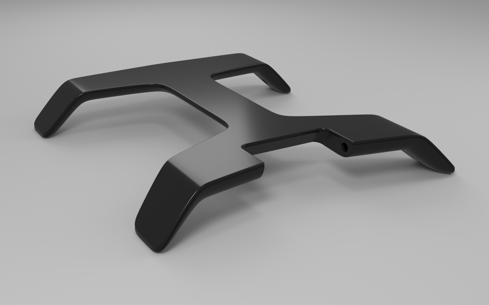 Product Design Challenges Behind the Tstand Base: Ergonomics, Sink Marks, Snap-Fits, and Lifters 4 CAD render of the assembled Tstand base, an H-shaped injection molded part whose product design challenges included sink marks and snap-fits
